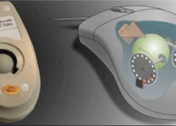 Diagram potongan internal mouse komputer yang menunjukkan sakelar (switch), pegas, dan ruang resonansi penyebab bunyi klik.