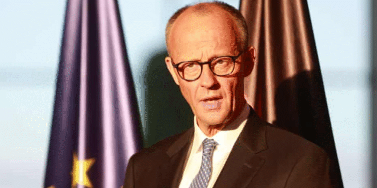 Potret Kanselir Jerman Friedrich Merz dengan latar bendera