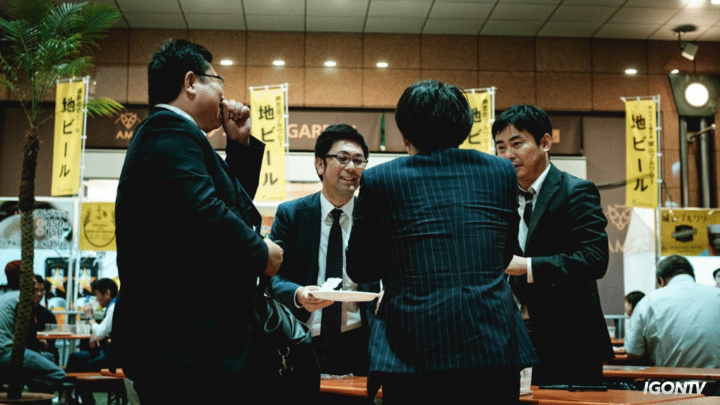 Chinese office workers in a meeting with laptops